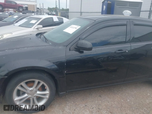 2014 Dodge Avenger SE with VIN 1C3CDZAB2EN229221, listed as a IAAI auction lot 42632298 with 163,229 mi miles and . Bid and sale history available at DreamBid. Image 6.