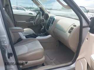 2005 Mercury Mariner Luxury z VIN 4M2YU56155DJ18530, wystawiony jako IAAI lot #42307355 z przebiegiem 74 905 mil mil oraz . Historia ofert i sprzedaży dostępna na DreamBid. Obrazek 5.