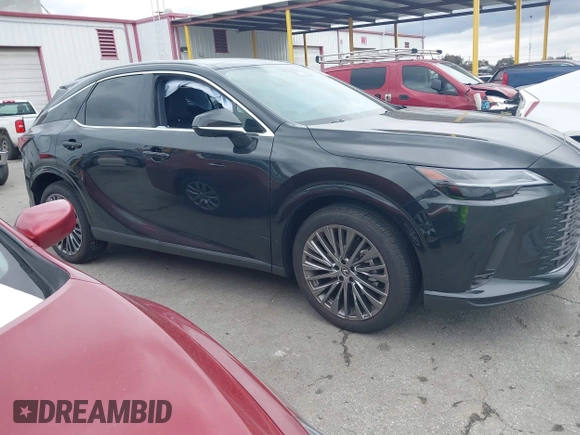 2024 Lexus RX 450h+ Luxury with VIN JTJCJMGA1R2022295, listed as a IAAI auction lot 41778650 with 1,822 mi miles and . Bid and sale history available at DreamBid. Image 13.