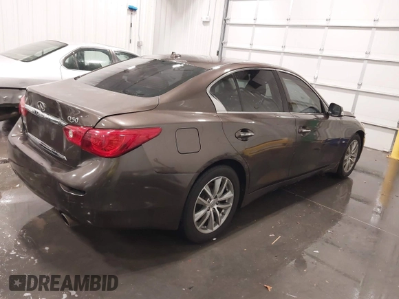 2015 Infiniti Q50 Premium z VIN JN1BV7ARXFM418280, wystawiony jako IAAI lot #42080879 z przebiegiem 126 411 mil mil oraz . Historia ofert i sprzedaży dostępna na DreamBid. Obrazek 4.