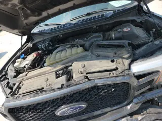 2019 Ford F-150 XL с VIN 1FTEW1CP8KKE58976, выставлен на аукционе Copart как лот 67820985 с пробегом 133 083 миль миль и Списание • Salvage title. История ставок и продаж доступна на DreamBid. Изображение 15.