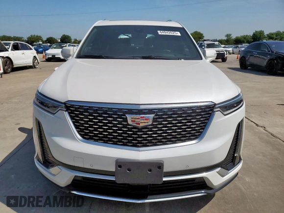 2024 Cadillac XT6 FWD Premium Luxury with VIN 1GYKPCRS7RZ711983, listed as a Copart auction lot 64842625 with 6,394 mi miles and Clean title. Bid and sale history available at DreamBid. Image 5.