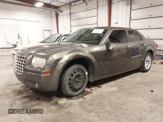 2010 Chrysler 300 Touring with VIN 2C3CA5CV9AH213299, listed as a IAAI auction lot 41754215 with 172,467 mi miles. Bid and sale history available at carsss.com. Image 2.