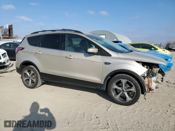 2017 Ford Escape SE with VIN 1FMCU0GD0HUD26729, listed as a Copart auction lot 44824135 with 102,549 mi miles and Salvage Title. Bid and sale history available at carsss.com. Image 4.
