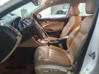 2012 Buick Regal Premium 1 with VIN 2G4GS5EK0C9147232, listed as a Copart auction lot 52810755 with 162,445 mi miles and Salvage Title. Bid and sale history available at DreamBid. Image 7.
