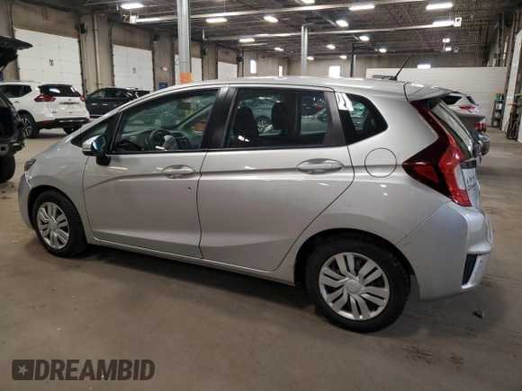 2015 Honda Fit LX с VIN 3HGGK5H56FM720996, выставлен на аукционе Copart как лот 57565945 с пробегом 90 222 миль миль и Списание • Salvage title. История ставок и продаж доступна на DreamBid. Изображение 2.