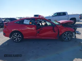 2019 Honda Civic Sport with VIN 2HGFC2F89KH556513, listed as a IAAI auction lot 41676082 with Not Provided miles and . Bid and sale history available at DreamBid. Image 14.