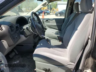 2005 Dodge Caravan SXT z VIN 2D4GP44L15R182362, wystawiony jako Copart lot #54702625 z przebiegiem 185 114 mil mil oraz Szkody całkowita. Historia ofert i sprzedaży dostępna na DreamBid. Obrazek 7.