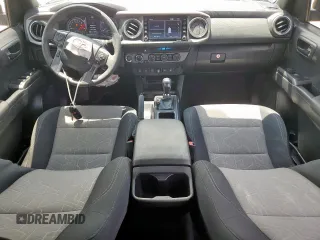 2023 Toyota Tacoma SR z VIN 3TMCZ5AN5PM598443, wystawiony jako Copart lot #60485035 z przebiegiem 18 842 mil mil oraz Szkoda całkowita • Salvage title. Historia ofert i sprzedaży dostępna na DreamBid. Obrazek 8.