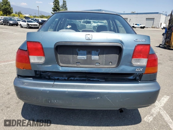 1998 Honda Civic DX with VIN JHMEJ6624WS000450, listed as a Copart auction lot 54217265 with 299,994 mi miles and Salvage Title. Bid and sale history available at carsss.com. Image 6.