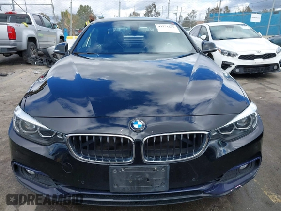2018 BMW 4 Series 430i z VIN WBA4Z1C55JEC59897, wystawiony jako IAAI lot #41774609 z przebiegiem 80 017 mil mil oraz . Historia ofert i sprzedaży dostępna na DreamBid. Obrazek 12.