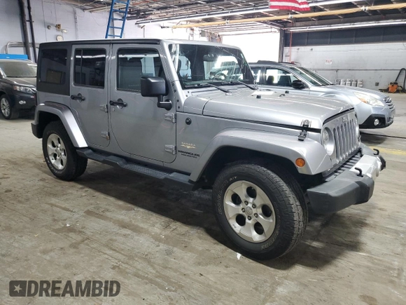 2015 Jeep Wrangler Unlimited Sahara with VIN 1C4BJWEG5FL743663, listed as a Copart auction lot 60205225 with 69,922 mi miles and Salvage title. Bid and sale history available at DreamBid. Image 4.