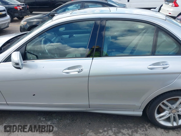 2014 Mercedes-Benz C 250 Sport with VIN WDDGF4HB1EA951907, listed as a IAAI auction lot 42580563 with 51,592 mi miles and . Bid and sale history available at DreamBid. Image 15.