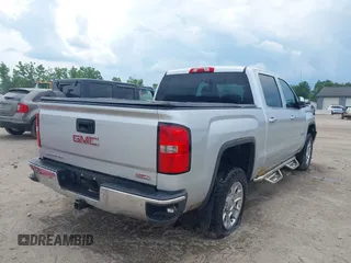 2014 GMC Sierra 1500 SLT with VIN 3GTU2VEC2EG100051, listed as a IAAI auction lot 40363924 with 149,636 mi miles and . Bid and sale history available at DreamBid. Image 4.