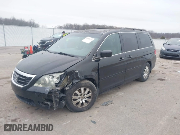 2010 Honda Odyssey EX-L with VIN 5FNRL3H73AB078714, listed as a IAAI auction lot 41520151 with 218,466 mi miles and . Bid and sale history available at DreamBid. Image 2.