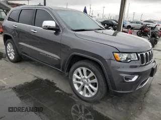 2017 Jeep Grand Cherokee Limited with VIN 1C4RJEBG8HC617099, listed as a Copart auction lot 59698505 with 79,154 mi miles and Salvage title. Bid and sale history available at DreamBid. Image 4.