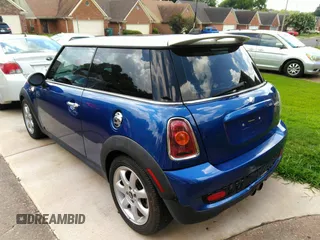 2009 MINI Hardtop S with VIN WMWMF735X9TW80840, listed as a IAAI auction lot 42717130 with 101,073 mi miles and . Bid and sale history available at DreamBid. Image 3.