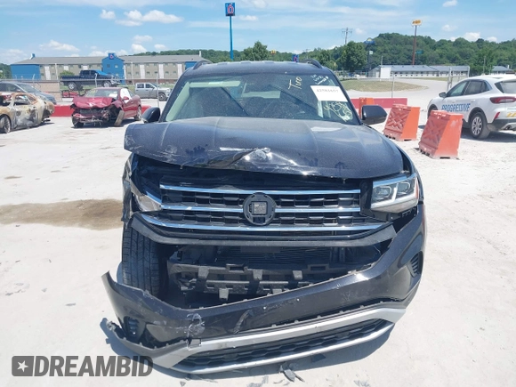 2021 Volkswagen Atlas SE with VIN 1V2WR2CAXMC586838, listed as a IAAI auction lot 42581657 with 60,922 mi miles and . Bid and sale history available at DreamBid. Image 12.