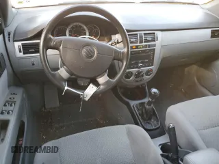 2007 Suzuki Forenza z VIN KL5JD56Z27K530714, wystawiony jako Copart lot #73358864 z przebiegiem 127 196 mil mil oraz Szkody całkowita. Historia ofert i sprzedaży dostępna na DreamBid. Obrazek 8.