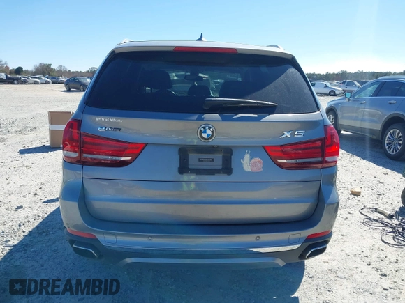 2016 BMW X5 xDrive40e z VIN 5UXKT0C50G0F75010, wystawiony jako IAAI lot #41732410 z przebiegiem 88 671 mil mil oraz . Historia ofert i sprzedaży dostępna na DreamBid. Obrazek 16.