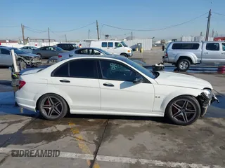 2012 Mercedes-Benz C 63 AMG with VIN WDDGF7HB2CA661318, listed as a IAAI auction lot 41841635 with 125,085 mi miles and . Bid and sale history available at carsss.com. Image 13.