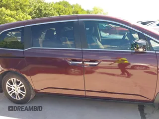 2011 Honda Odyssey EX-L with VIN 5FNRL5H60BB094647, listed as a IAAI auction lot 42223712 with 202,612 mi miles and . Bid and sale history available at carsss.com. Image 13.