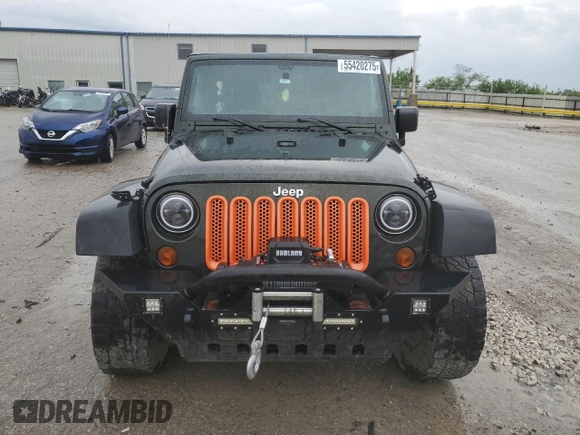 2011 Jeep Wrangler Unlimited Rubicon z VIN 1J4BA6H16BL615993, wystawiony jako Copart lot #55420275 z przebiegiem 200 403 mil mil oraz Szkoda całkowita • Salvage title. Historia ofert i sprzedaży dostępna na DreamBid. Obrazek 5.