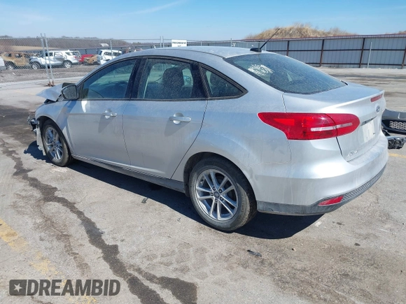 2018 Ford Focus SE with VIN 1FADP3F23JL315341, listed as a IAAI auction lot 41834939 with 121,686 mi miles. Bid and sale history available at carsss.com. Image 3.