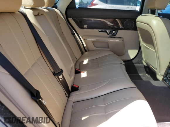 2015 Jaguar XJ Portfolio with VIN SAJWJ2GD9F8V89685, listed as a Copart auction lot 59161545 with 59,338 mi miles and Clean title. Bid and sale history available at DreamBid. Image 10.