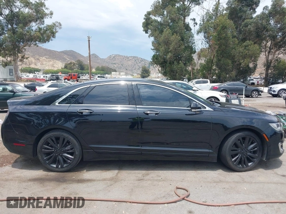2017 Lincoln MKZ Reserve z VIN 3LN6L5EC2HR622768, wystawiony jako IAAI lot #42394044 z przebiegiem 78 914 mil mil oraz . Historia ofert i sprzedaży dostępna na DreamBid. Obrazek 13.
