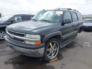 2004 Chevrolet Tahoe LT with VIN 1GNEK13T54J146851, listed as a IAAI auction lot 41990571 with 172,025 mi miles. Bid and sale history available at carsss.com. Image 2.