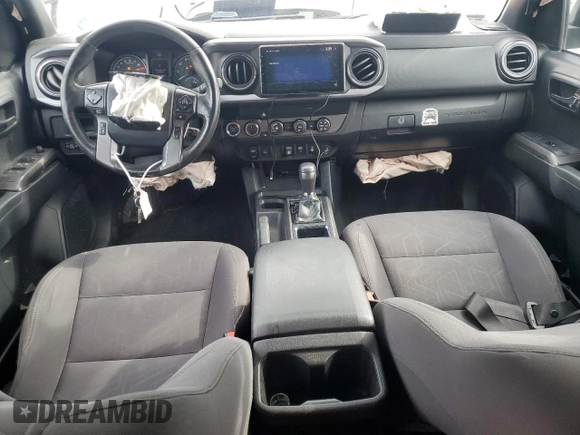 2019 Toyota Tacoma SR with VIN 3TMCZ5AN2KM193701, listed as a Copart auction lot 56776385 with 112,990 mi miles and Salvage title. Bid and sale history available at DreamBid. Image 8.