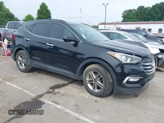 2017 Hyundai Santa Fe 2.4L with VIN 5NMZUDLB0HH037142, listed as a IAAI auction lot 42323880 with 87,396 mi miles and . Bid and sale history available at DreamBid. Image 1.