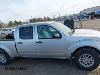 2014 Nissan Frontier SL z VIN 1N6AD0FV3EN767134, wystawiony jako IAAI lot #41463305 z przebiegiem 63 553 mil mil oraz . Historia ofert i sprzedaży dostępna na DreamBid. Obrazek 13.