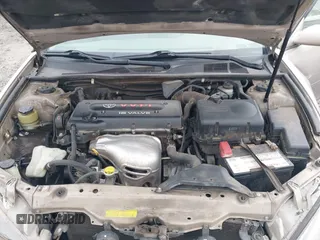 2002 Toyota Camry LE z VIN 4T1BE32K72U028489, wystawiony jako IAAI lot #41760604 z przebiegiem 163 950 mil mil oraz . Historia ofert i sprzedaży dostępna na DreamBid. Obrazek 10.