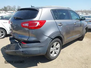 2011 Kia Sportage LX with VIN KNDPBCA20B7170217, listed as a IAAI auction lot 42303069 with 186,994 mi miles and . Bid and sale history available at DreamBid. Image 4.