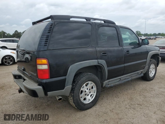 2003 Chevrolet Tahoe Z71 z VIN 1GNEK13Z13R301464, wystawiony jako Copart lot #53905395 z przebiegiem 165 360 mil mil oraz Szkoda całkowita • Salvage title. Historia ofert i sprzedaży dostępna na DreamBid. Obrazek 3.