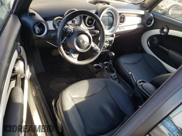 2012 MINI Convertible с VIN WMWZN3C52CT133828, выставлен на аукционе Copart как лот 89387935 с пробегом 106 567 миль миль и Списание • Salvage title. История ставок и продаж доступна на DreamBid. Изображение 8.
