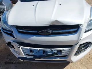 2013 Ford Escape SEL with VIN 1FMCU0HX0DUC07372, listed as a IAAI auction lot 41740884 with 96,436 mi miles and . Bid and sale history available at DreamBid. Image 6.