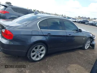 2007 BMW 3 Series 335xi with VIN WBAVD53577A006071, listed as a IAAI auction lot 41924859 with 128,693 mi miles. Bid and sale history available at carsss.com. Image 13.
