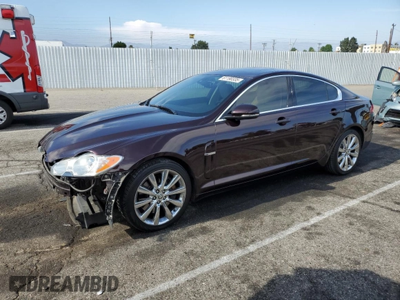2011 Jaguar XF Premium with VIN SAJWA0GB1BLS08325, listed as a Copart auction lot 61190335 with 61,656 mi miles and Salvage title. Bid and sale history available at DreamBid. Image 1.