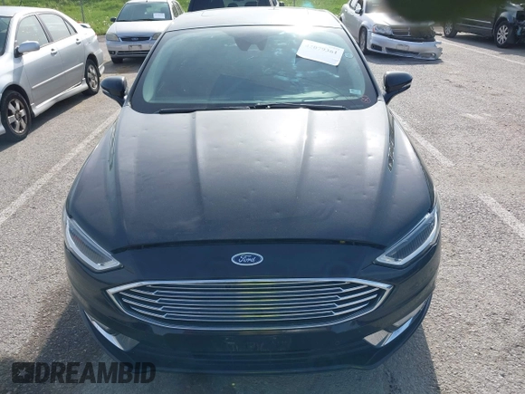 2017 Ford Fusion Titanium with VIN 3FA6P0K91HR257462, listed as a IAAI auction lot 42079361 with 124,914 mi miles and . Bid and sale history available at DreamBid. Image 12.