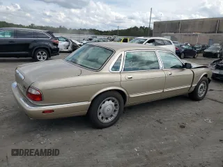 1999 Jaguar XJ z VIN SAJKX6048XC849376, wystawiony jako Copart lot #70538064 z przebiegiem 122 891 mil mil oraz Szkoda całkowita • Salvage title. Historia ofert i sprzedaży dostępna na DreamBid. Obrazek 3.