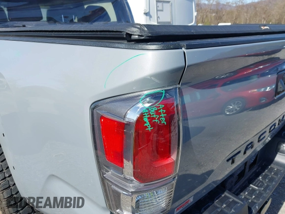 2020 Toyota Tacoma SR5 z VIN 5TFCZ5AN5LX229019, wystawiony jako IAAI lot #41907694 z przebiegiem 79 355 mil mil oraz . Historia ofert i sprzedaży dostępna na DreamBid. Obrazek 21.