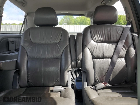 2005 Honda Odyssey Touring z VIN 5FNRL38835B071258, wystawiony jako Copart lot #57878295 z przebiegiem 143 474 mil mil oraz Szkoda całkowita • Salvage title. Historia ofert i sprzedaży dostępna na DreamBid. Obrazek 10.