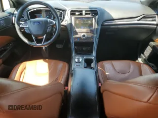 2020 Ford Fusion Titanium с VIN 3FA6P0K99LR174094, выставлен на аукционе Copart как лот 52583435 с пробегом 98 389 миль миль и Списание • Salvage title. История ставок и продаж доступна на DreamBid. Изображение 8.