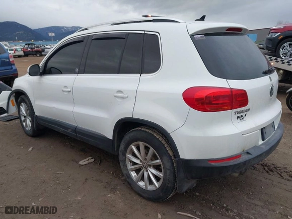 2017 Volkswagen Tiguan Wolfsburg Edition with VIN WVGSV7AX6HK003768, listed as a IAAI auction lot 41137411 with 117,862 mi miles. Bid and sale history available at carsss.com. Image 3.