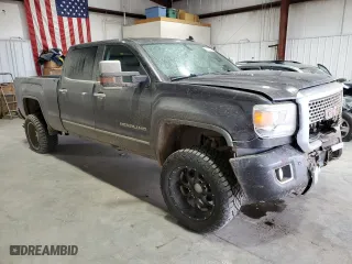 2015 GMC Sierra 2500HD Denali with VIN 1GT120E84FF514856, listed as a Copart auction lot 61423374 with 204,130 mi miles and Salvage Title. Bid and sale history available at carsss.com. Image 4.