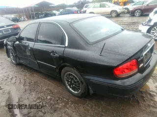 2002 Hyundai Sonata with VIN KMHWF25S32A536478, listed as a IAAI auction lot 40368380 with 80,952 mi miles. Bid and sale history available at carsss.com. Image 3.