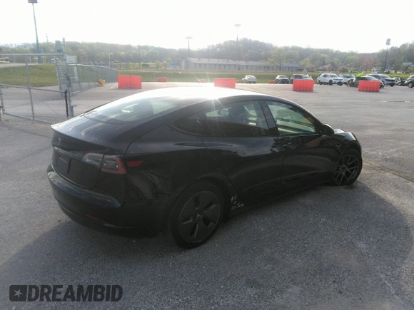 2023 Tesla Model 3 with VIN 5YJ3E1EA8PF626073, listed as a IAAI auction lot 39148336 with 1,551 mi miles and . Bid and sale history available at carsss.com. Image 4.